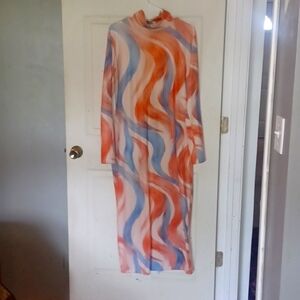 XL watercolor dress orange, cream, and blue plenty of stretch.